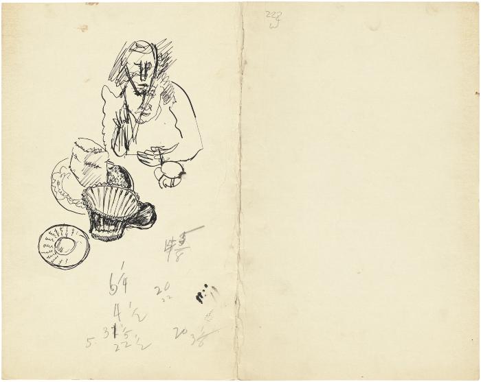 [Woman seated at table]