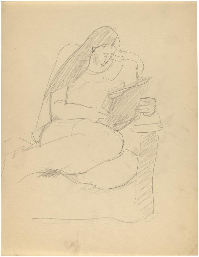 [Woman in chair reading]