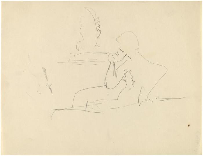 [Seated figure]