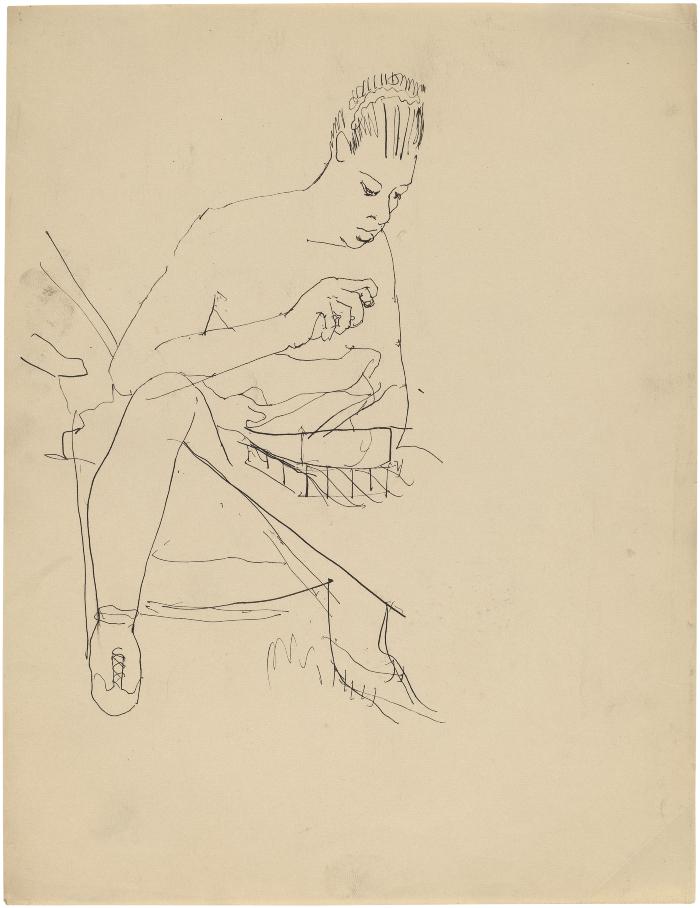 [Woman seated at table]