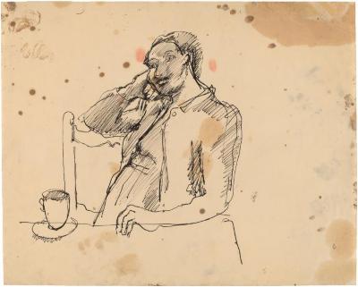 [Woman seated at table]