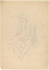 [Woman seated at table]