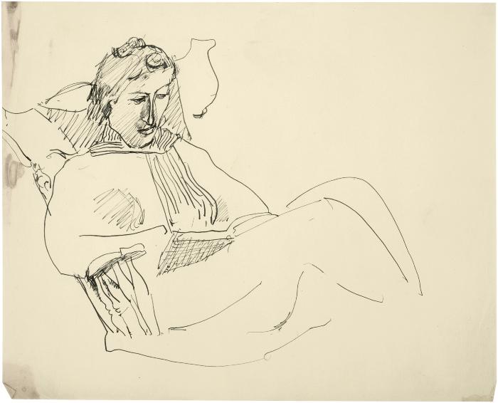 [Woman in chair reading]