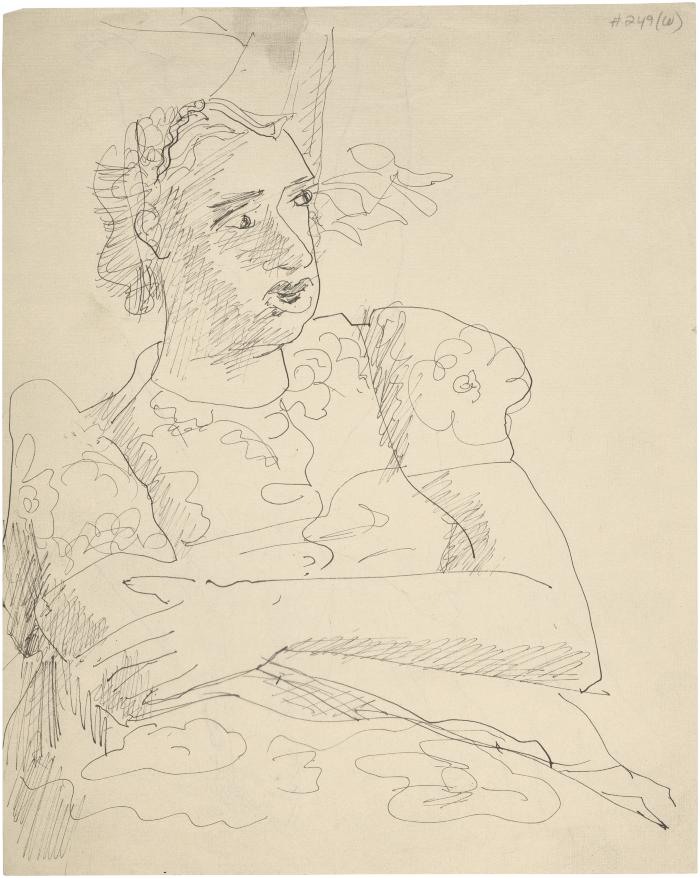 [Seated woman wearing flowered dress in outdoor setting]