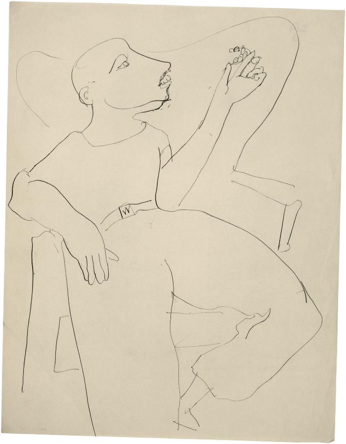 [Man in wingback chair holding dental prosthetic]