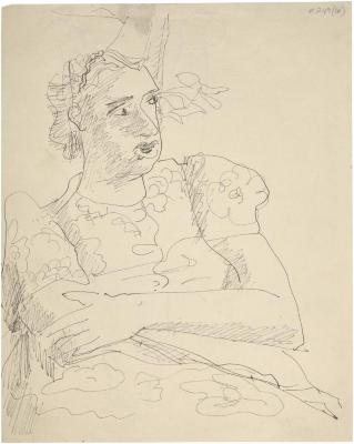 [Seated woman wearing flowered dress in outdoor setting]