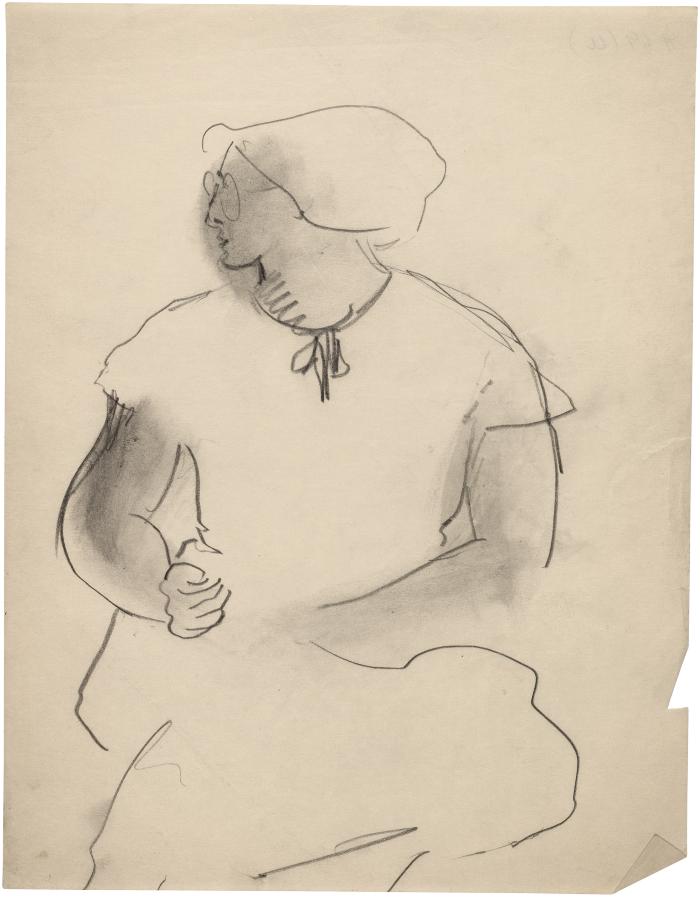 [Seated woman with eyeglasses]