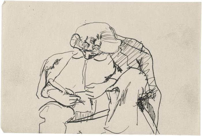 [Seated woman working with handheld tool]