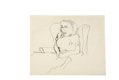 [Woman in an armchair]